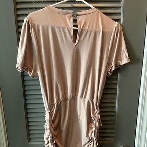 Worn once, no sign of tear or anything Kittenish